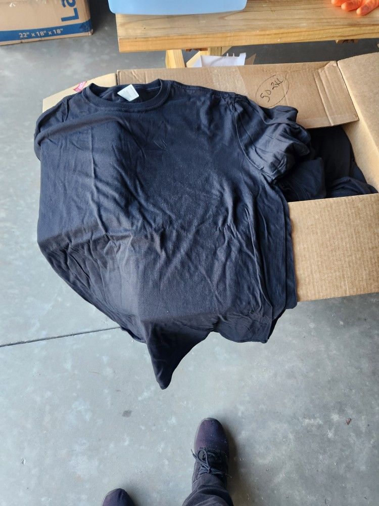 4 Boxes Of Plain Black T's. S,M,L,XL,XXL