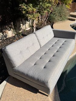 CB2 mid-century one arm sofa