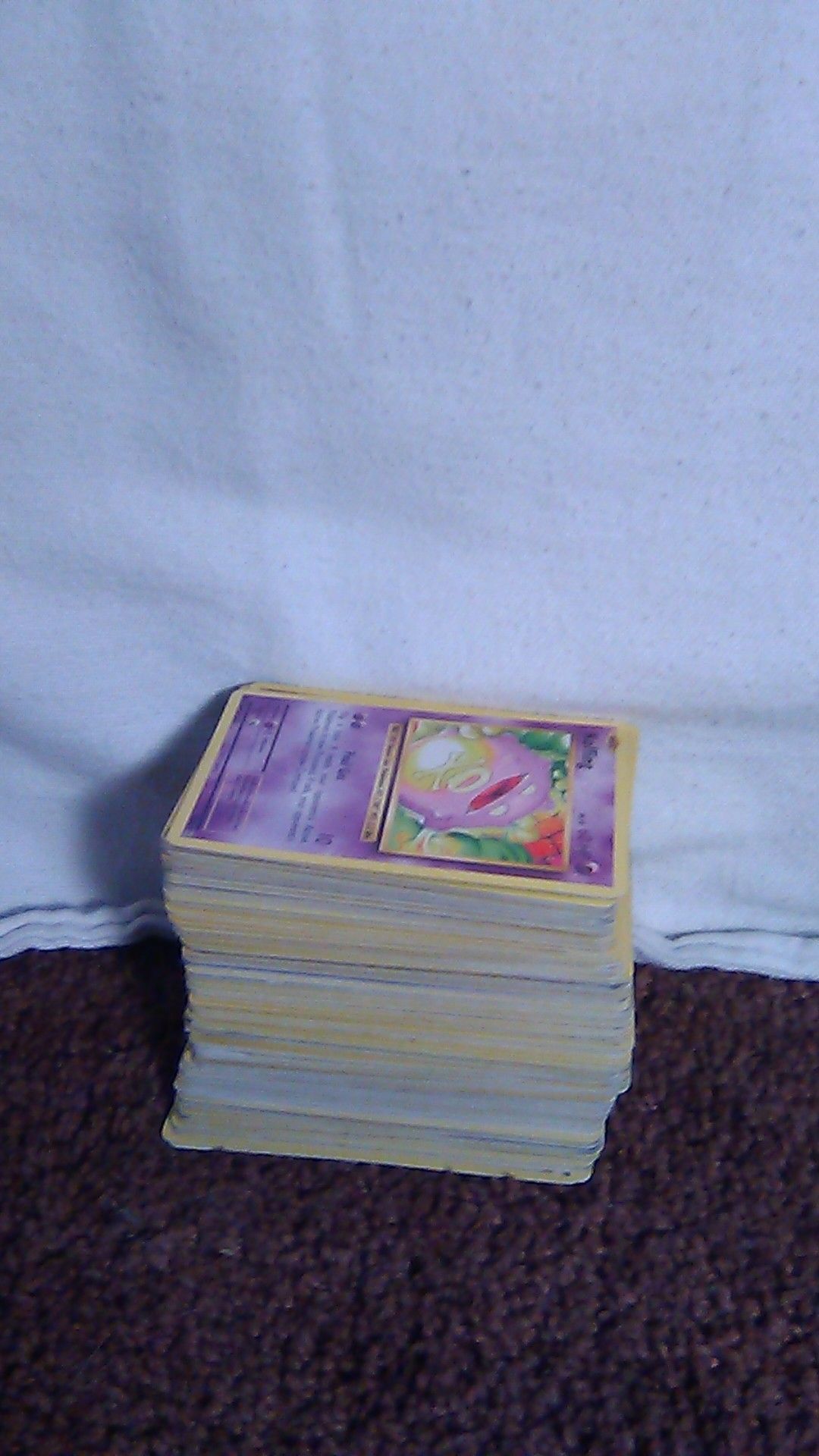 A huge stack of Pokemon cards