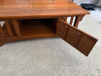 Wooden table with storage