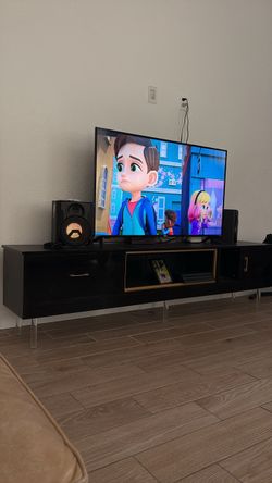 Black TV Stand with Gold Accents