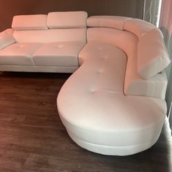 New Sectional W Curved Chaise.  99” X 85”.  White Leather.  Free Delivery!