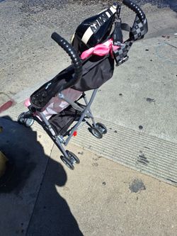 Minnie mouse stroller plus a purse