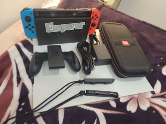 NINTENDO SWITCH V2 NEON BLUE AND RED COMPLETE WITH ACCESSORIES 100%
