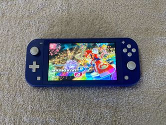 NINTENDO SWITCH LITE + 50 POPULAR SWITCH GAMES