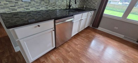 Granite counter top with sink and faucet