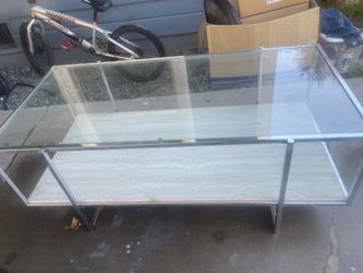 Glass top coffee table