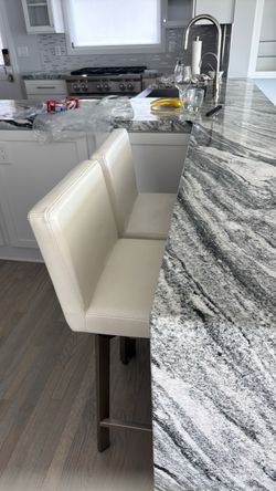 2 counter swivel chairs