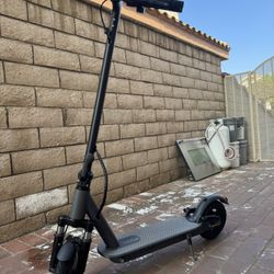 Double shock-absorbing electric scooter