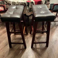 Set of two matching Brown Saddle style Bar Stools 