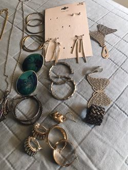 12 earrings 3 necklace 1 ring