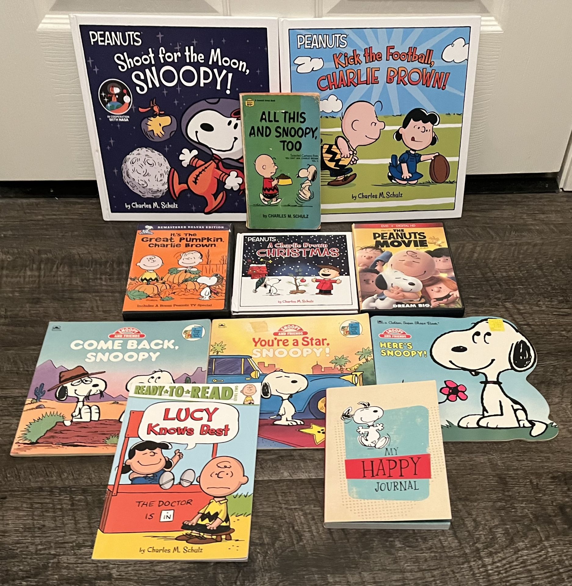 Snoopy and Peanuts Books and DVDS (Lot of 11)