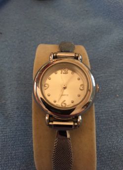Silver tone watch and band