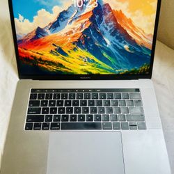 2019 15” Touchbar Macbook Pro 2.9Ghz i7 16Gb Ram 512GB SSD OS Sequoia