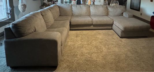 Large grey sectional couch.