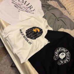 2 bape shirts and an amiri shirt