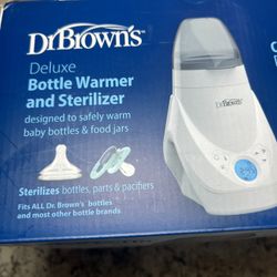 DrBrowns Deluxe Bottle Warmer and Sterilizer designed to safely warm baby bottles & food jars