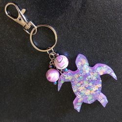 Purple glow in the dark turtle resin keychain purse charm with iridescent and star glitter new 