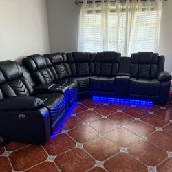POWER RECLINING SOFA WITH SPEAKERS, LED LIGHTS, USB, BLUETOOTH, CUP HOLDERS AND ARM STORAGE  