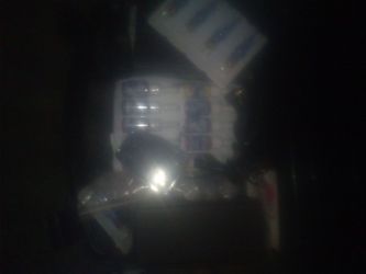 Tattoo gun, ink, needles, pedal