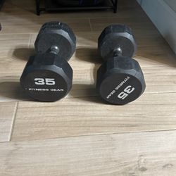 Two 35 lbs dumbbells