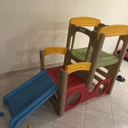 children’s playhouse with slide