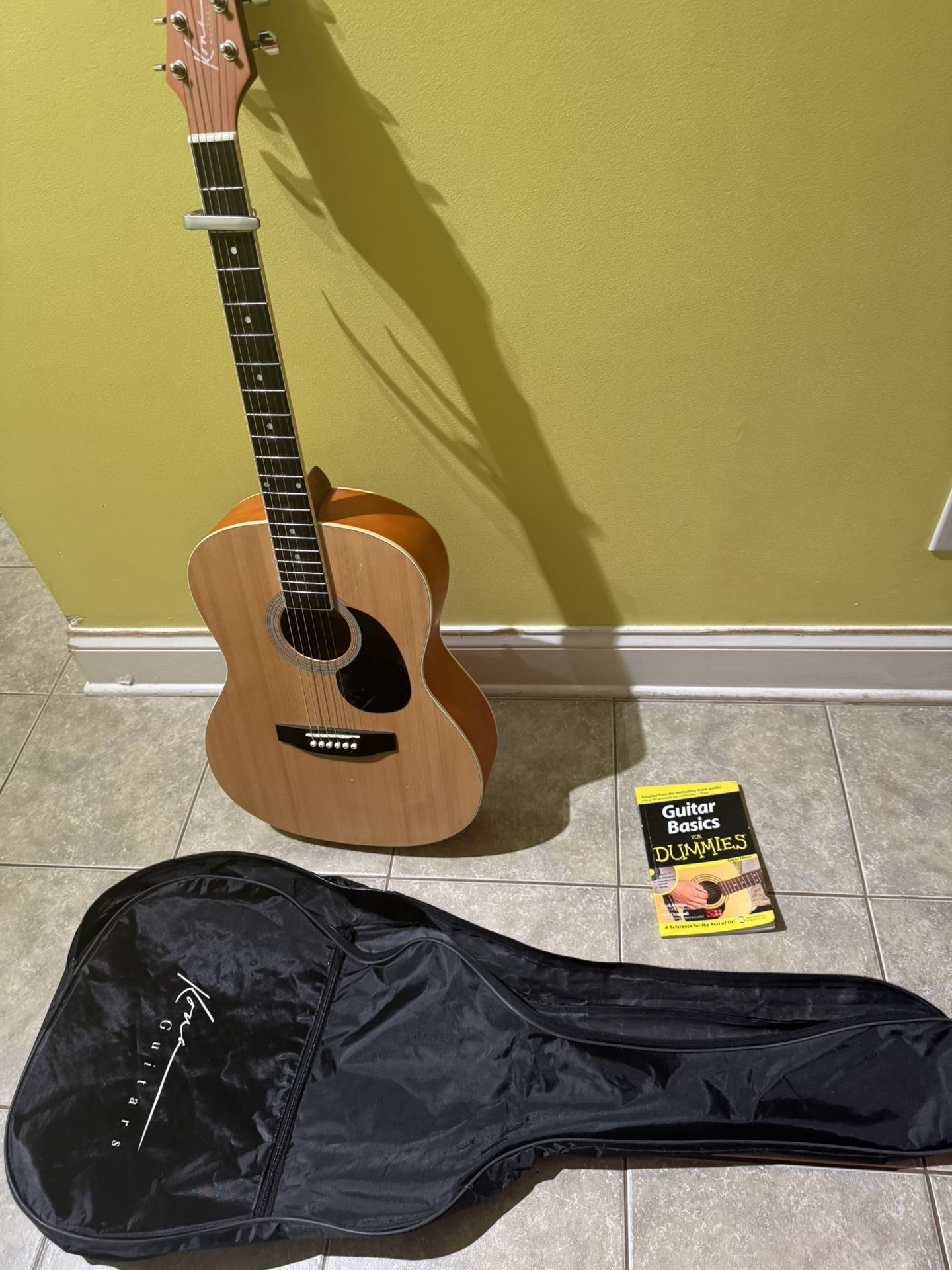 Full size Acoustic guitar PLUS learning book and carry on bag