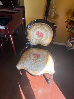 Decorative, floral tan/yellow chair