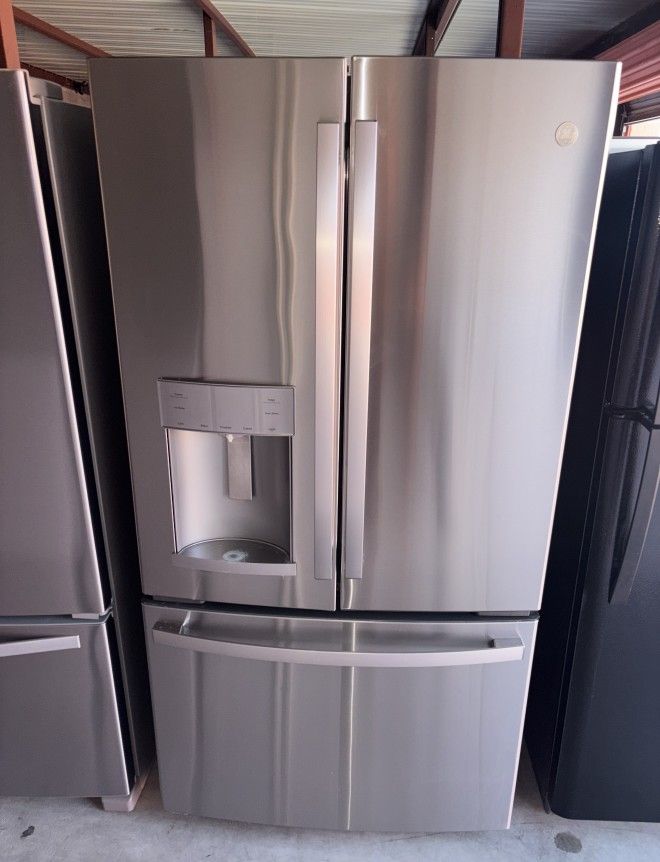 GE Stainless Steel Refrigerator And Freezer