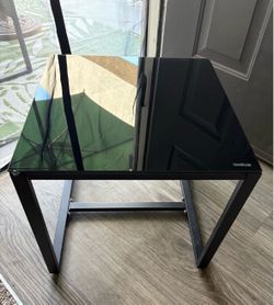Tempered-glass coffee table.