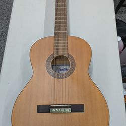 Sunlight guitar. Includes carry case. One broken string. $60