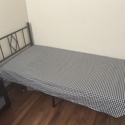 Twin size bed frame and bed mattress 