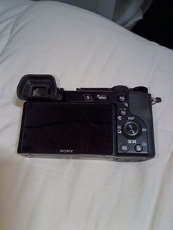 6100 Sony camara  no lente no cargador
