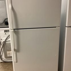 GE 33 in. Garage Ready 21 cu.ft. Top Freezer Refrigerator In White 