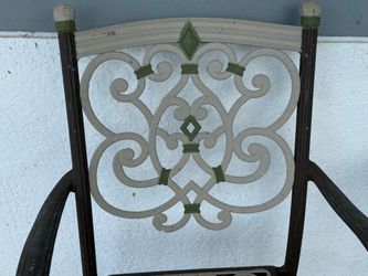 Wrought iron table with granite inlay, 4 chairs & 6 cushions