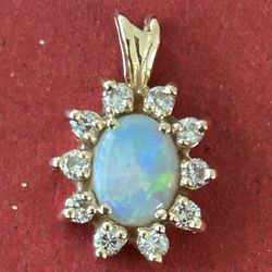 14k Gold Opel Stone With  Diamonds Pendant.  2.1g.