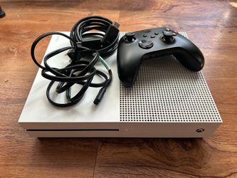 white Xbox One w/ cords and black controller
