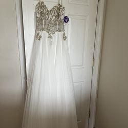 Formal Dress $50. Wedding Dress $100