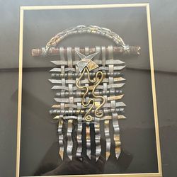 Framed modern art shadow box. woven colorful metal