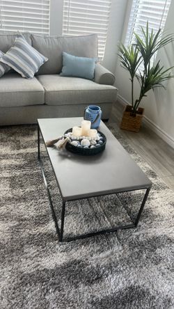 Sturdy industrial -looking gray coffee table - $15