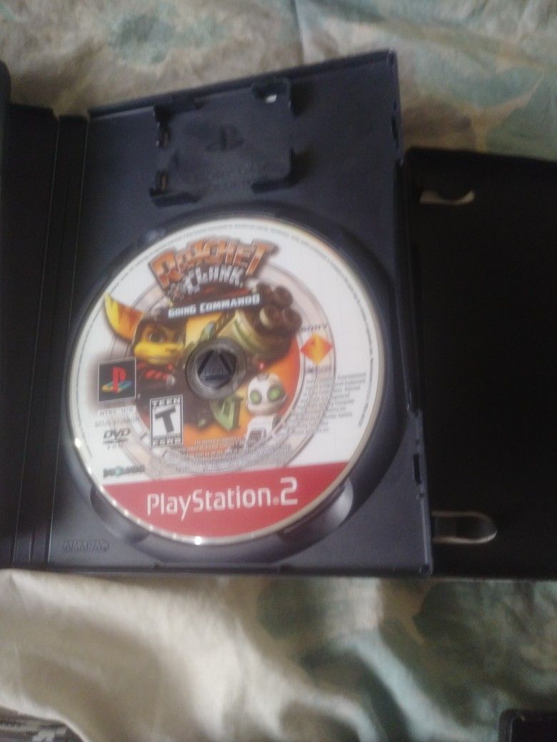 Ps2 With 5 Remotes And Games