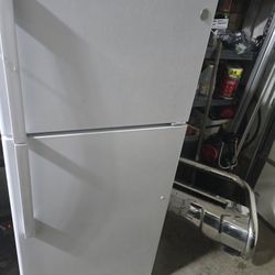 GE refrigerator topping, bottom white. Full size. 50 Inc Tall 21 Wide # 715