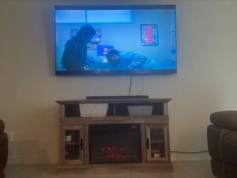 Tv stand with electric fireplace
