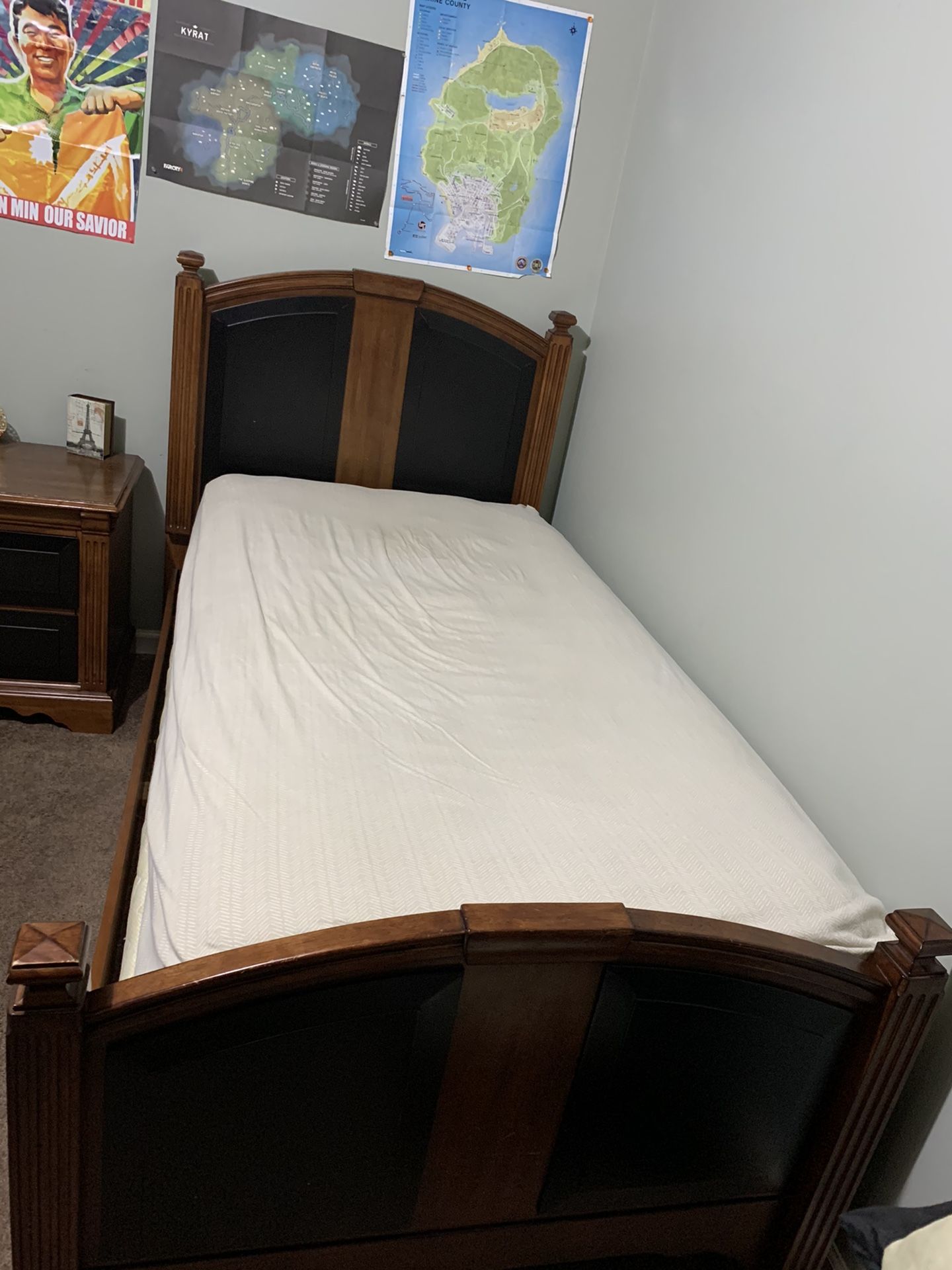 Twin bed with twin mattress and nightstand