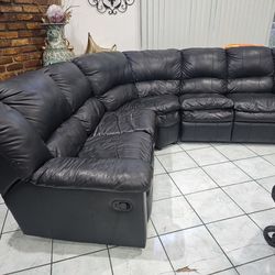 Black leather 2 reclining end seats couch 