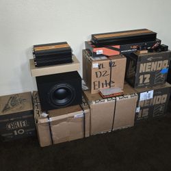 LOTS OF CAR AUDIO SUBS + AMPS