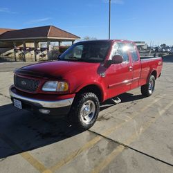 4x4 1999 Ford F150 170,000
