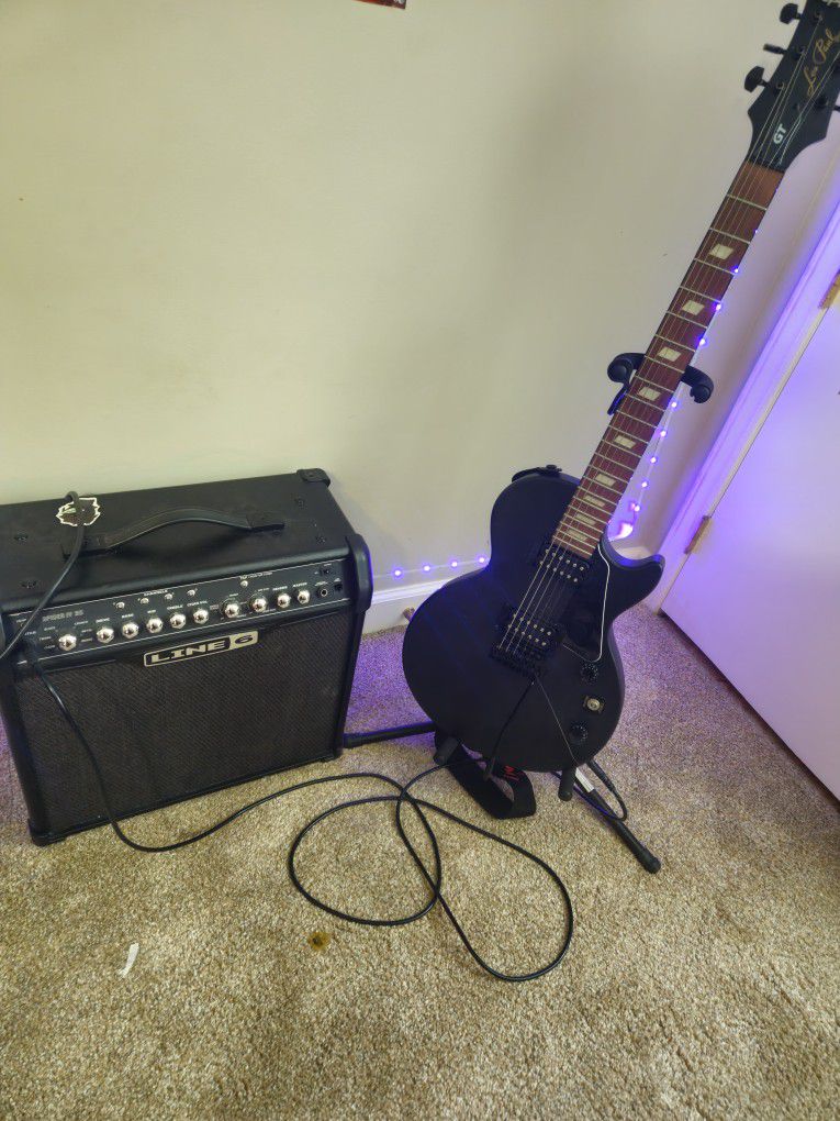 Les Paul Gt Special Guitar With Line Six Spider Iv Amp, Pick, Tuner, Aux Cord And Gig Bag