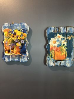 Handcrafted print of flowers transfer with mod podgeOn a distressed plank board