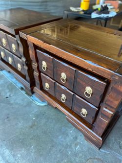 Wooden drawer set with brass lion head handles